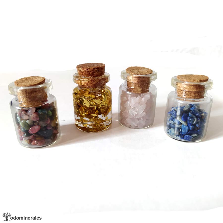 Colección Alquimia Mineral , cuatro frascos de energía con minerales naturales.
